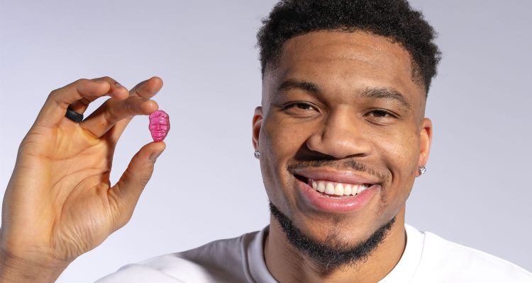 Giannis holding a Giannis gummy